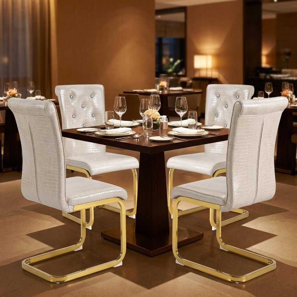 Set of Four Beige And Silver Tufted Faux Leather And Metal Dining Side Chairs HomeRoots