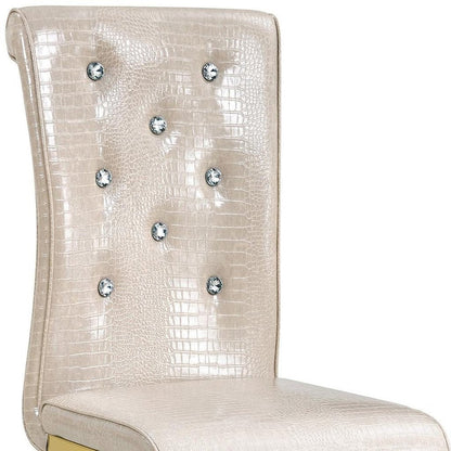 Set of Four Beige And Silver Tufted Faux Leather And Metal Dining Side Chairs HomeRoots