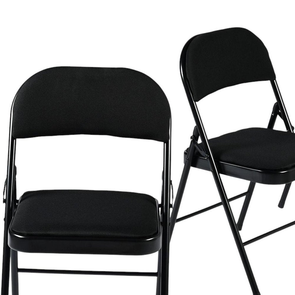 Set of Four Black Faux Leather and Steel Folding Chairs HomeRoots