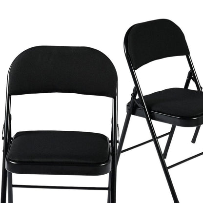 Set of Four Black Faux Leather and Steel Folding Chairs HomeRoots