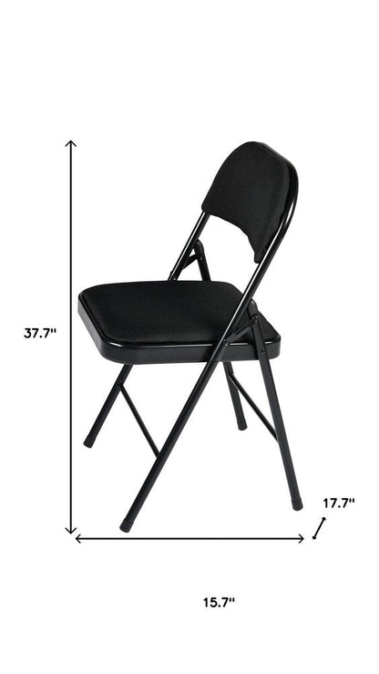 Set of Four Black Faux Leather and Steel Folding Chairs HomeRoots