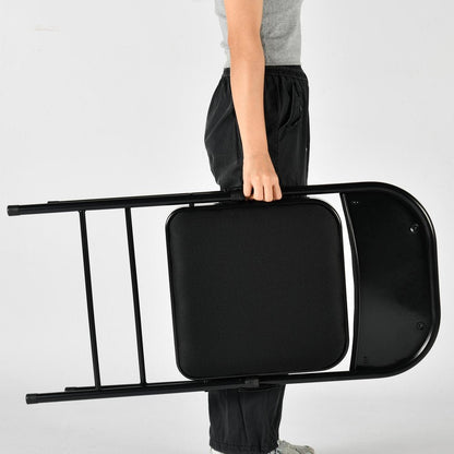 Set of Four Black Faux Leather and Steel Folding Chairs HomeRoots