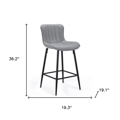 Set of Two 27" Gray And Black Faux Leather And Metal Low Back Counter Height Bar Chairs HomeRoots