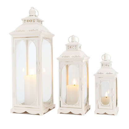 Set of Three Clear And White Glass And Metal Floor Lantern Candle Holders HomeRoots