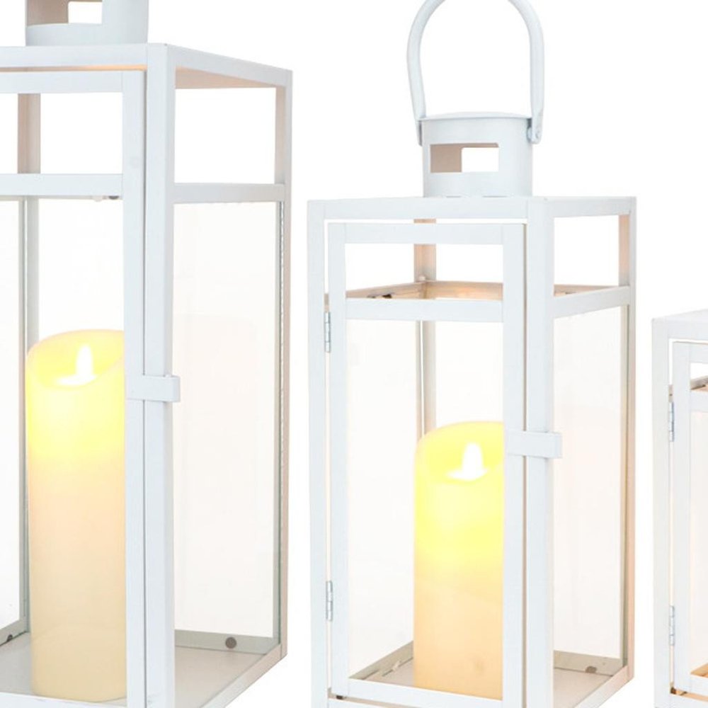 Set of Three Clear And White Glass And Stainless Steel Tabletop Lantern Candle Holders HomeRoots