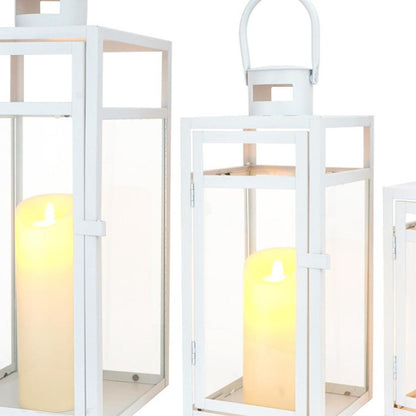 Set of Three Clear And White Glass And Stainless Steel Tabletop Lantern Candle Holders HomeRoots