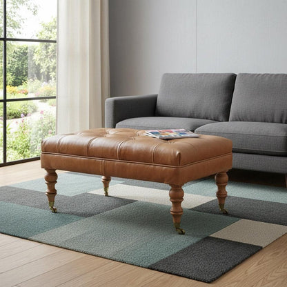 35" Black Brass And Brown Rolling Genuine Leather Tufted Ottoman