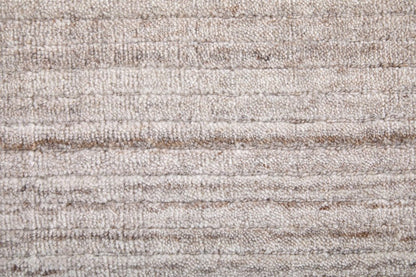 9' X 12' Ivory And Tan Handmade Indoor Outdoor Area Rug
