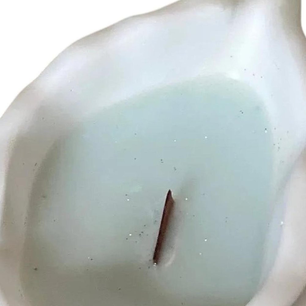 6" Light Blue Sea Salt And Orchid Scented Soy Wax Candle In White Resin Novelty Holder HomeRoots