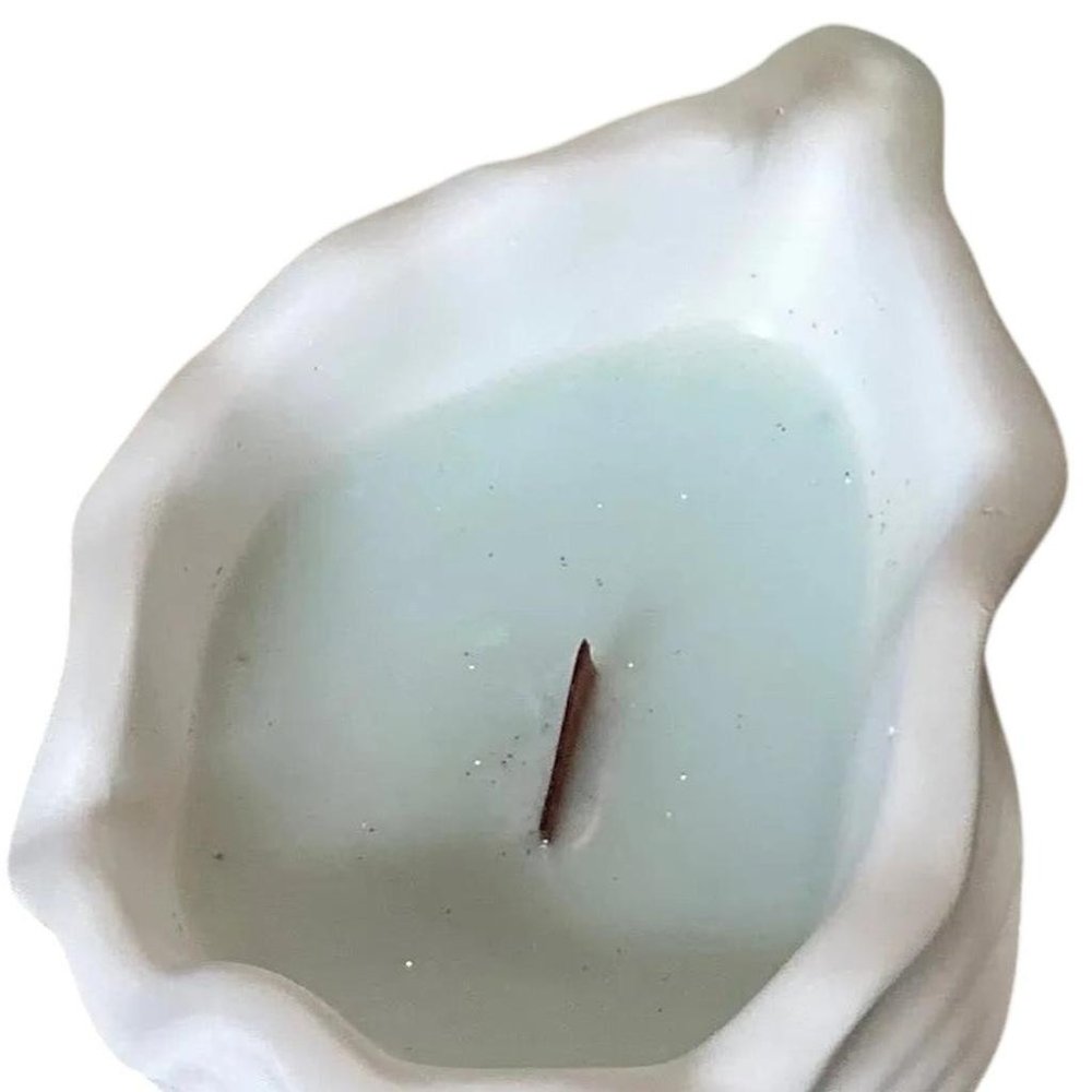 6" Light Blue Sea Salt And Orchid Scented Soy Wax Candle In White Resin Novelty Holder HomeRoots