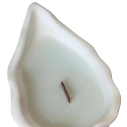 6" Light Blue Sea Salt And Orchid Scented Soy Wax Candle In White Resin Novelty Holder HomeRoots