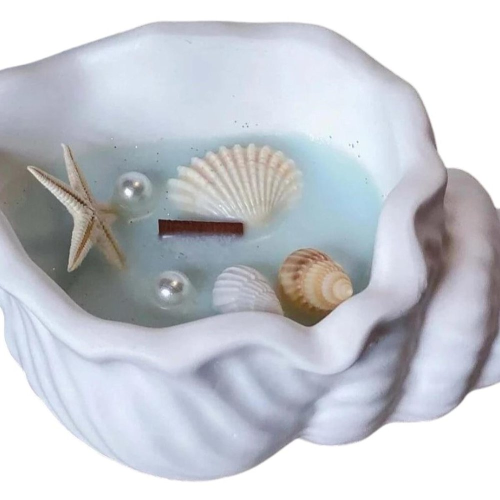 6" Light Blue Unscented Soy Wax Candle In White Resin Novelty Holder With Seashells — view 7