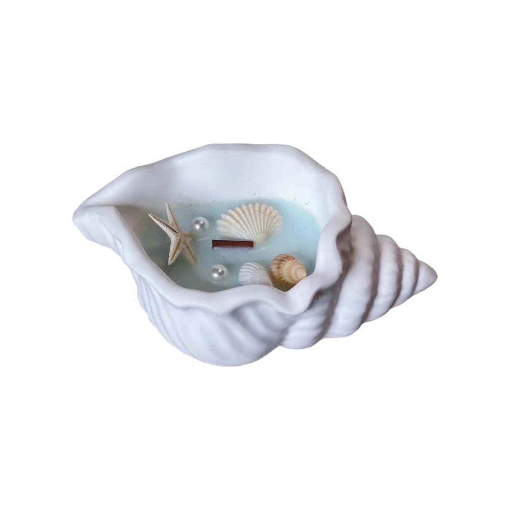 6" Light Blue Sea Salt And Orchid Scented Candle In White Resin Novelty Holder With Shells HomeRoots