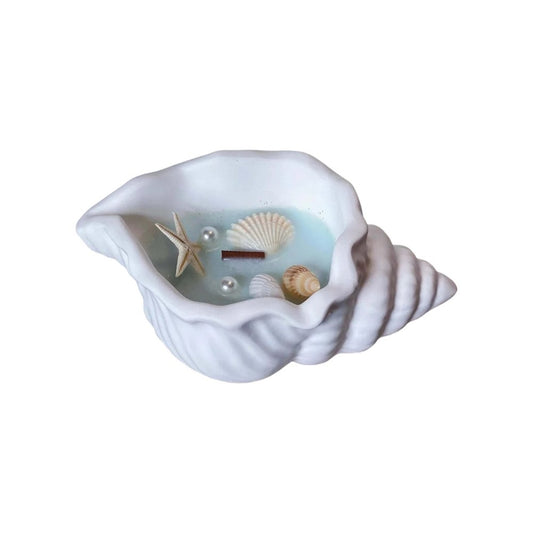 6" Light Blue Sea Salt And Orchid Scented Candle In White Resin Novelty Holder With Shells HomeRoots