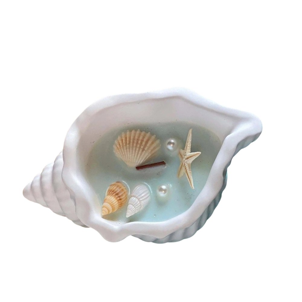 6" Light Blue Sea Salt And Orchid Scented Candle In White Resin Novelty Holder With Shells HomeRoots