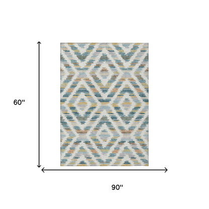 5' X 8' Teal Blue And Copper Tribal Washable Indoor Outdoor Area Rug HomeRoots