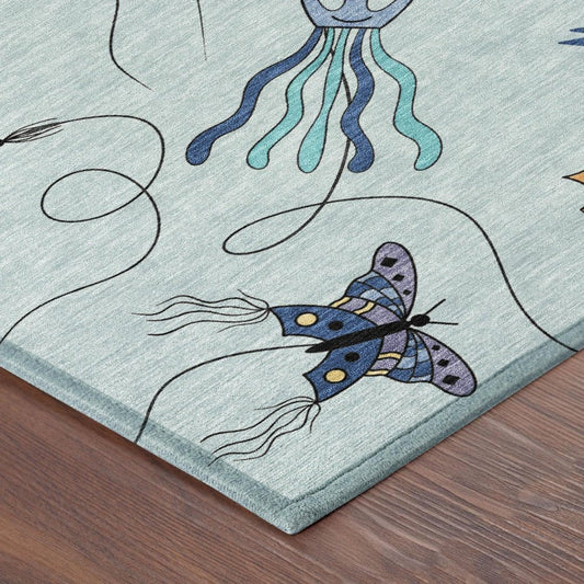 8' Sky Blue And Gold Round Geometric Washable Indoor Outdoor Area Rug