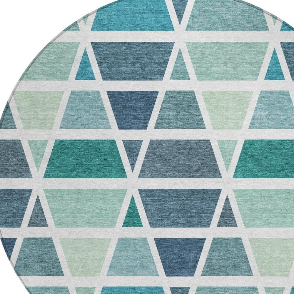 8' Teal Blue And White Round Geometric Washable Indoor Outdoor Area Rug
