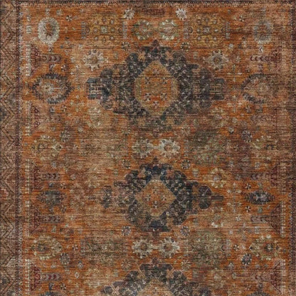 5' X 8' Rust And Orange Oriental Washable Indoor Outdoor Area Rug