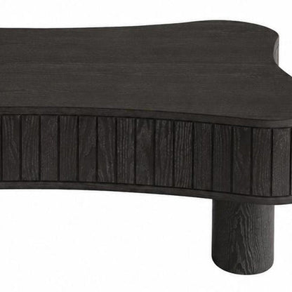 43" Black And Natural Wood And Solid Wood Oval Pedestal Coffee Table HomeRoots