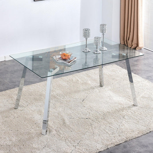 A modern minimalist rectangular glass dining table with tempered glass tabletop and silver metal legs - FurniFindUSA