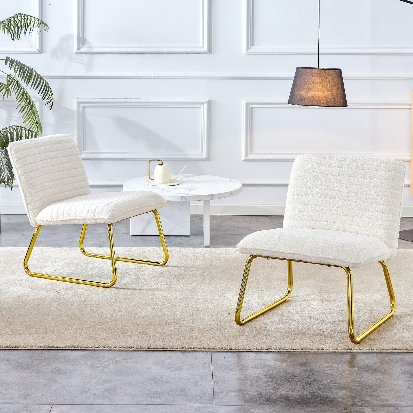 One White minimalist armless sofa chair with plush cushion and backrest paired with golden metal legs - FurniFindUSA