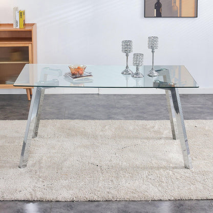 A modern minimalist rectangular glass dining table with tempered glass tabletop and silver metal legs - FurniFindUSA