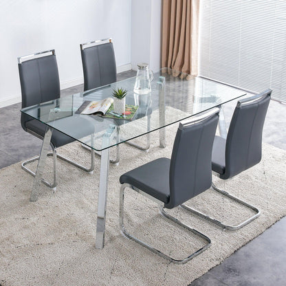 A modern minimalist rectangular glass dining table with tempered glass tabletop and silver metal legs - FurniFindUSA