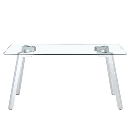 A modern minimalist rectangular glass dining table with tempered glass tabletop and silver metal legs - FurniFindUSA